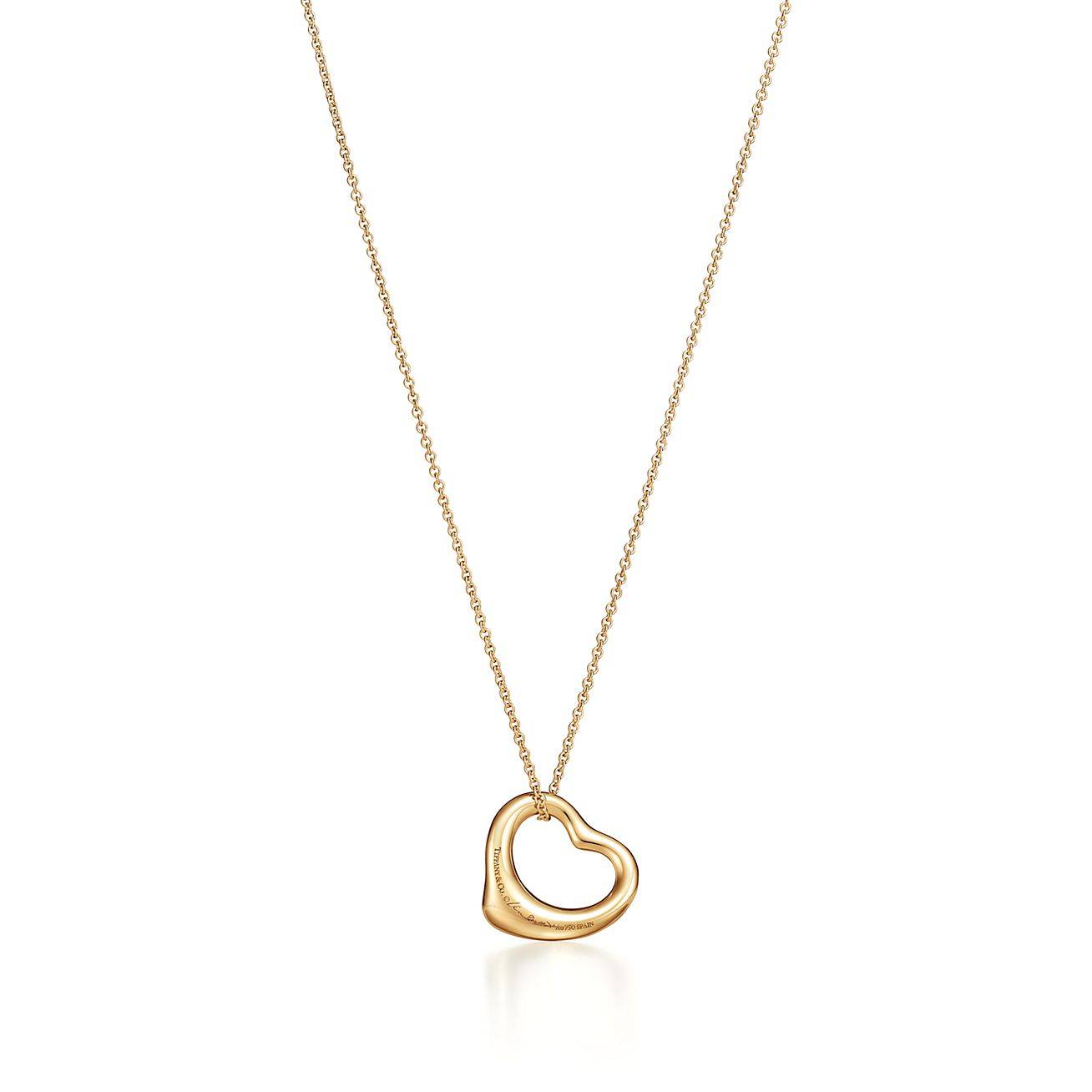 T*f*ny elsa peretti® open heart pendant in yellow gold with emeralds, 16 mm