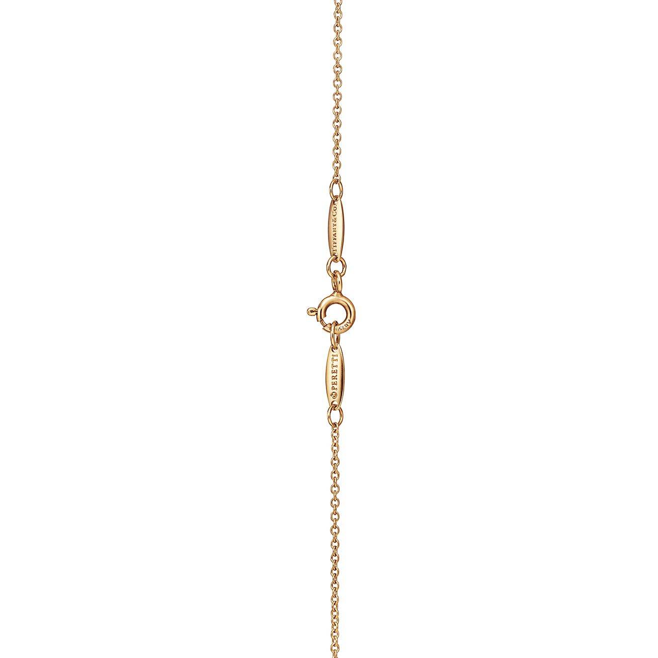 T*f*ny elsa peretti® open heart pendant in yellow gold with rubies, 16 mm