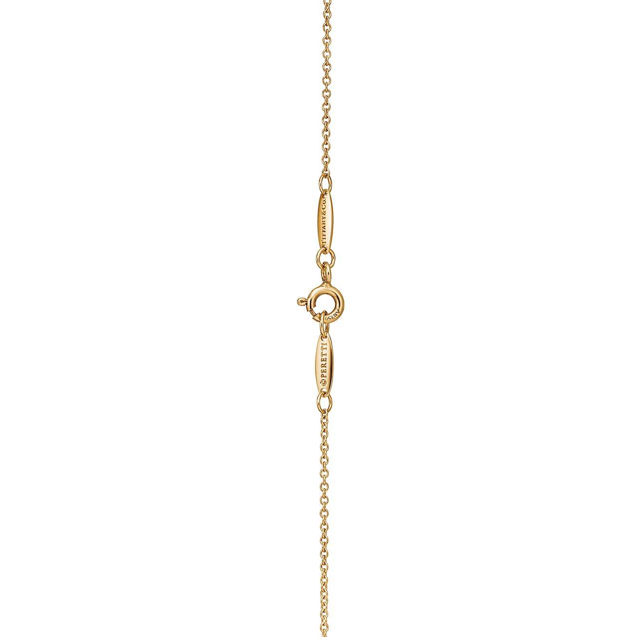T*f*ny elsa peretti® open heart pendant in 18k gold with diamonds